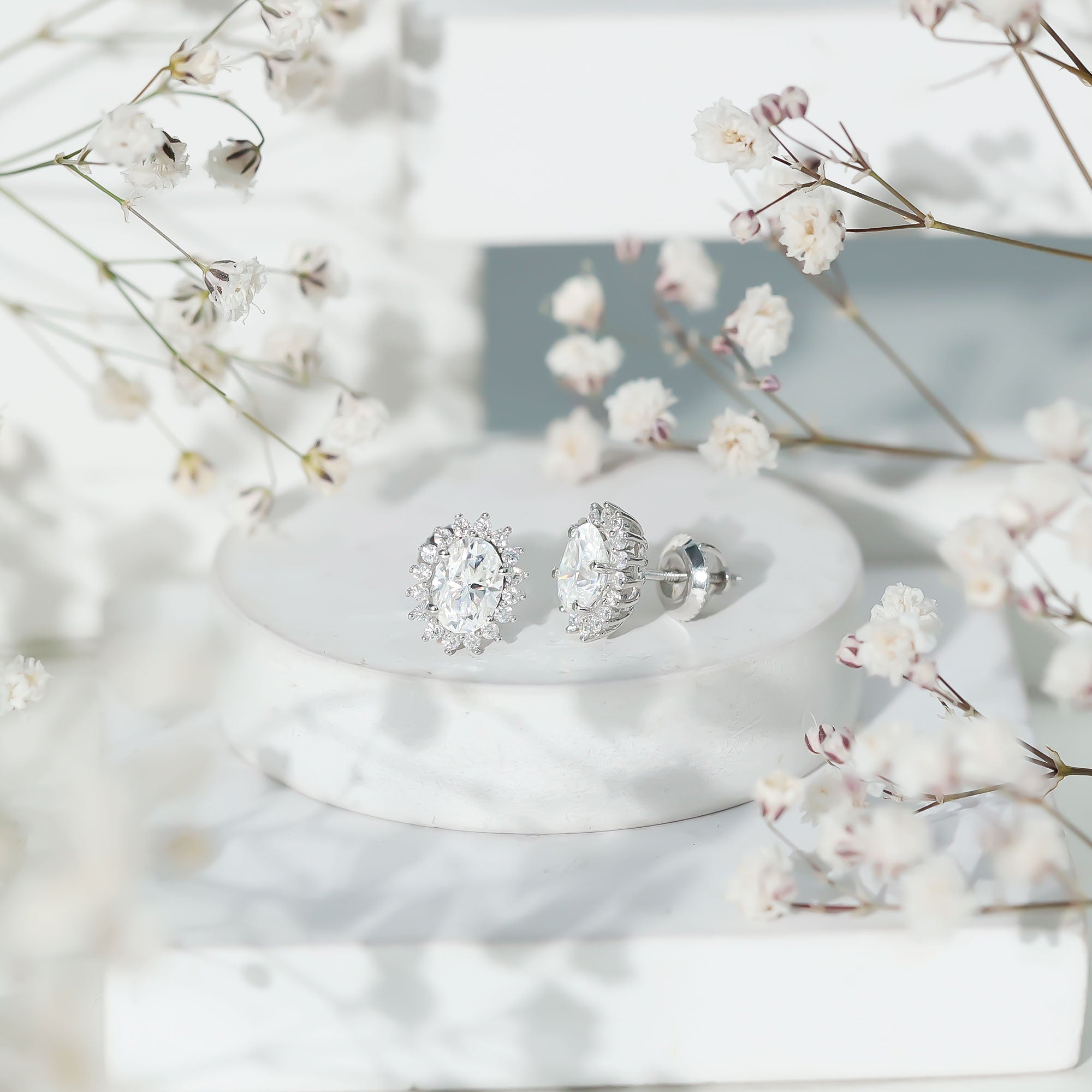 2 Carat Oval Moissanite Halo Stud Earrings In Sterling Silver