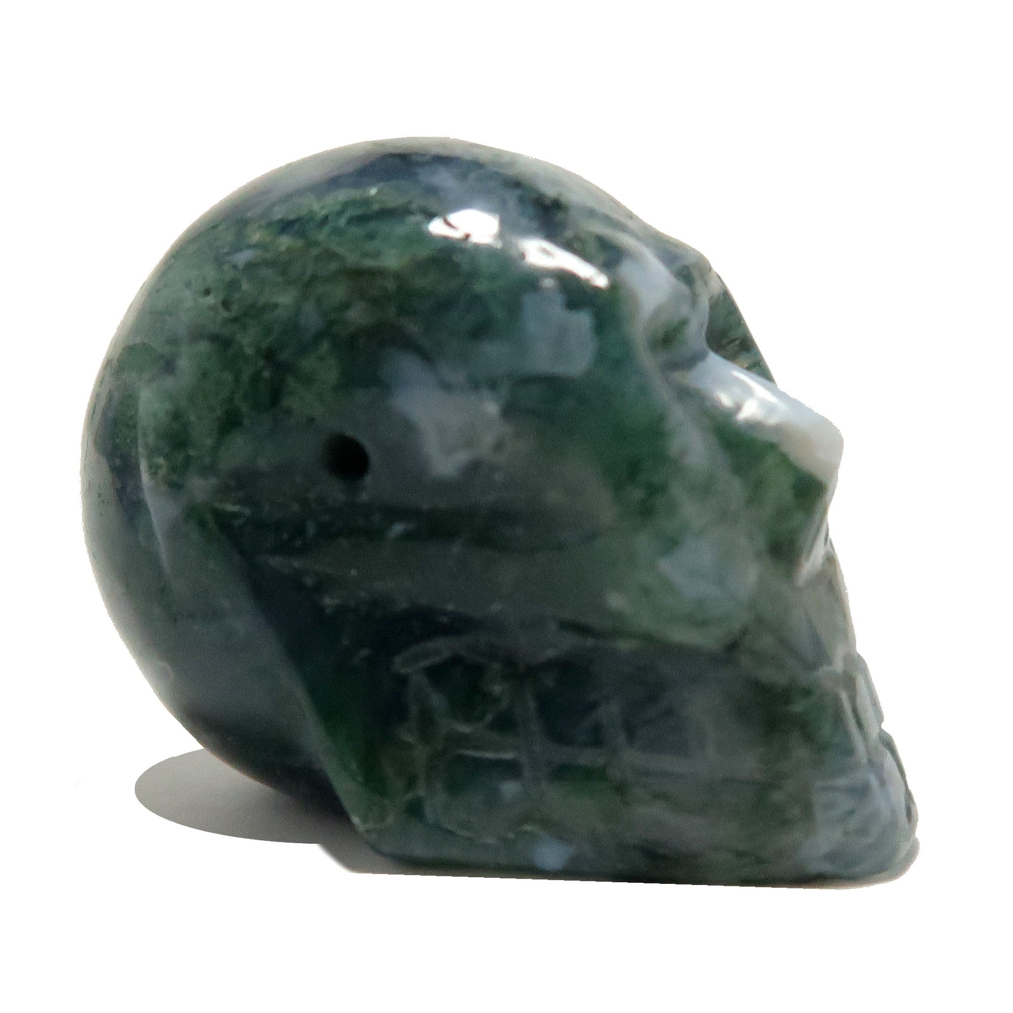 Perle de cristal vert relique tête de mort en agate mousse