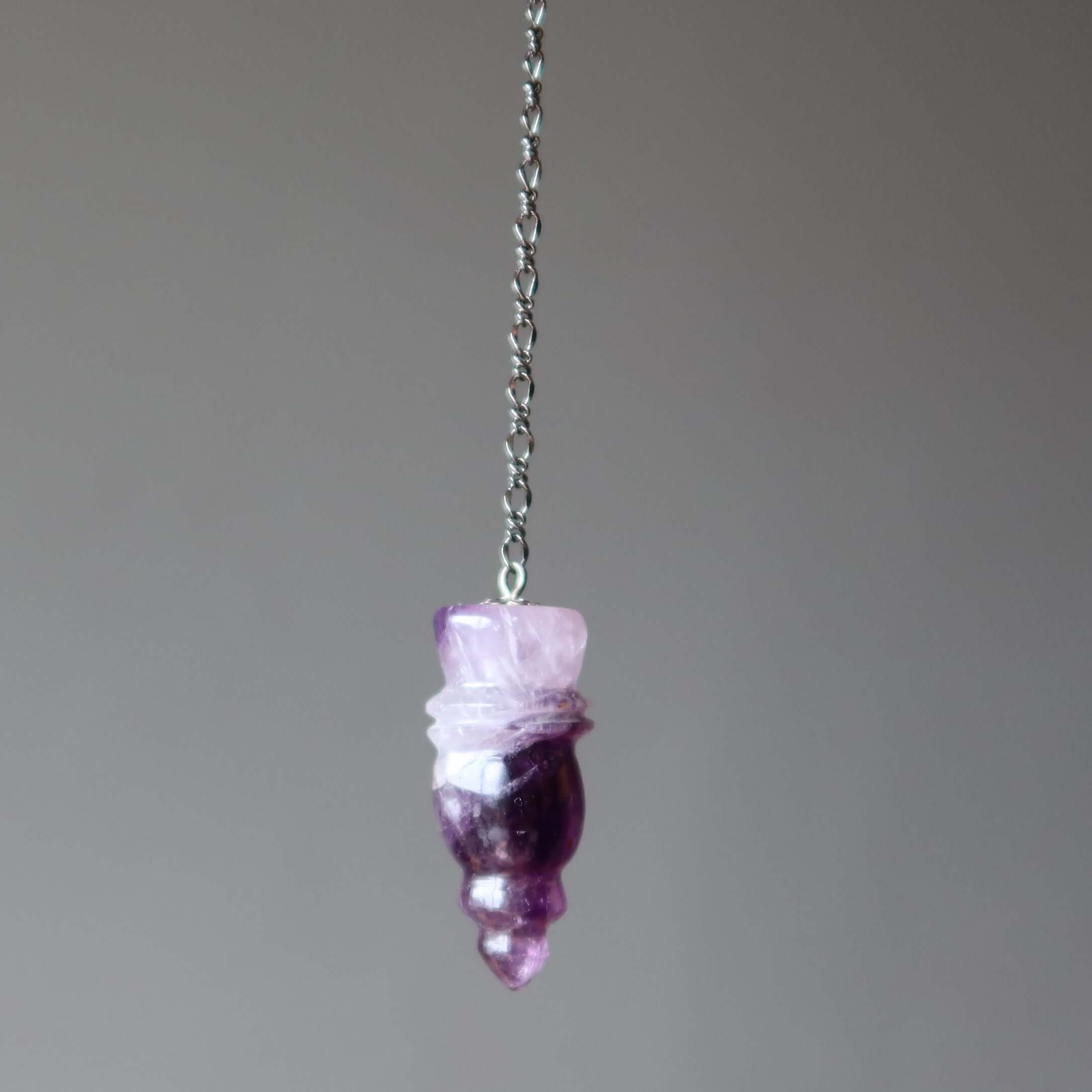 amethyst pendulum for dowsing carved purple crystal on silver chain for spiritual divination and Akashic Records access