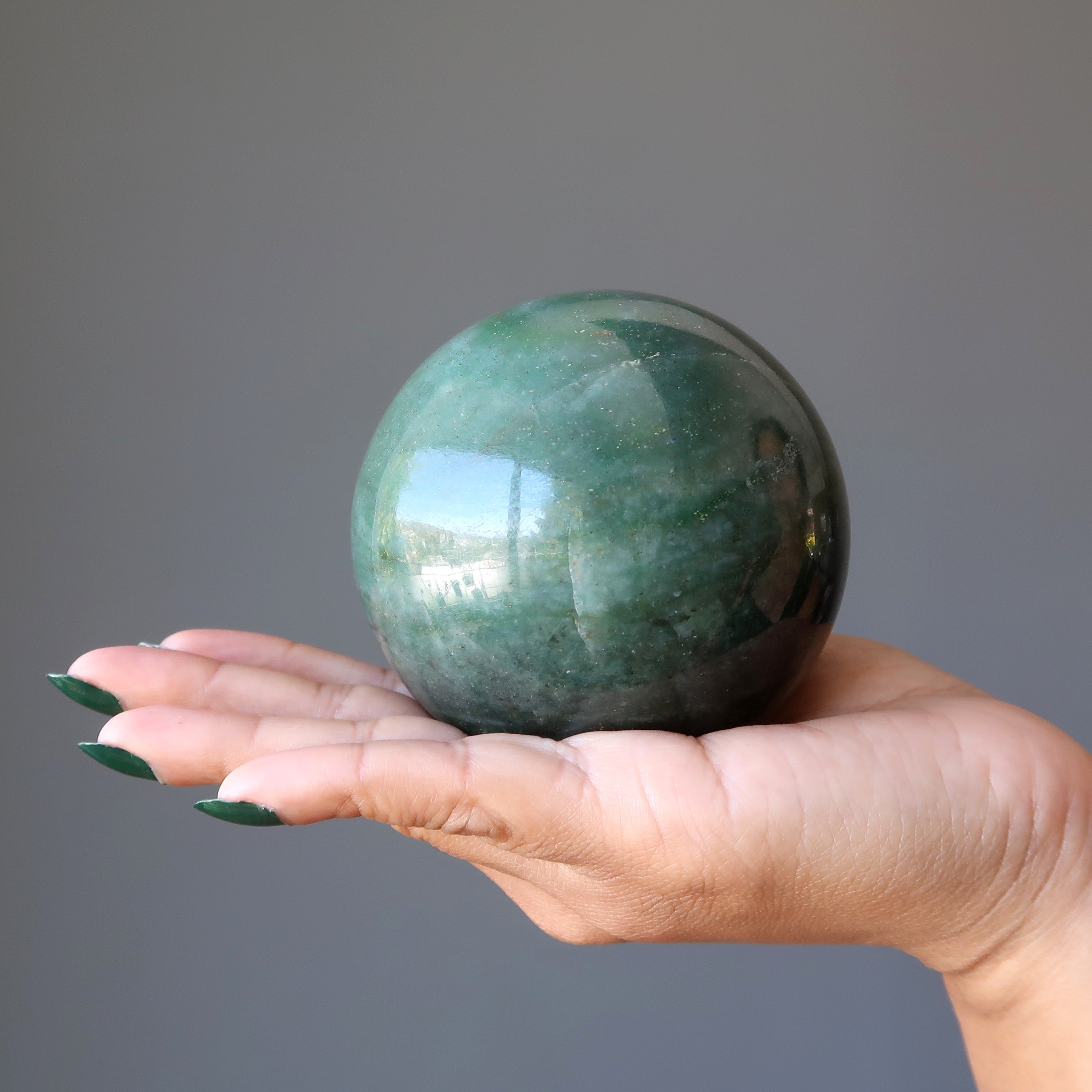 Sphère d'aventurine verte : Cristal de prospérité et d'abondance florissante