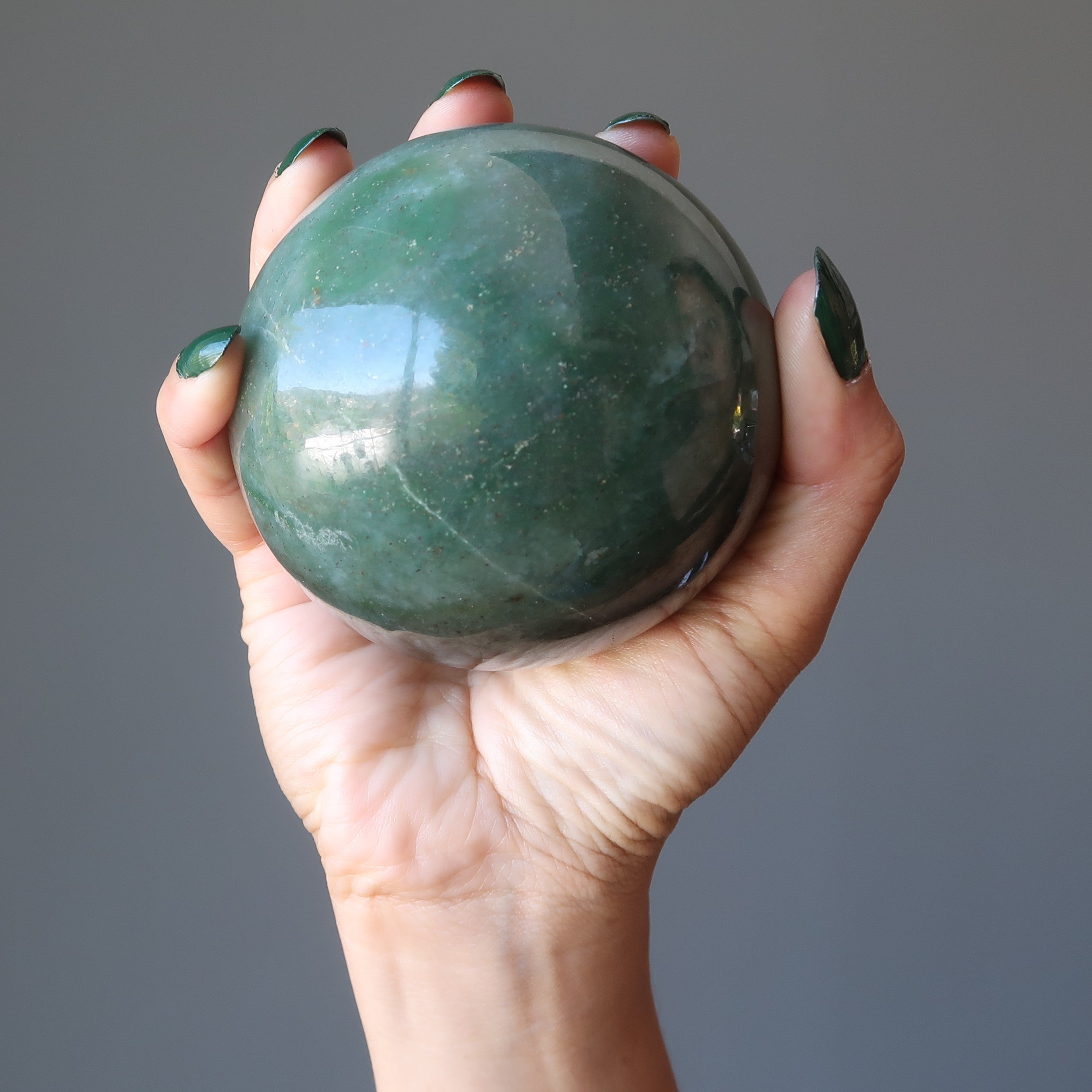 Sphère d'aventurine verte : Cristal de prospérité et d'abondance florissante