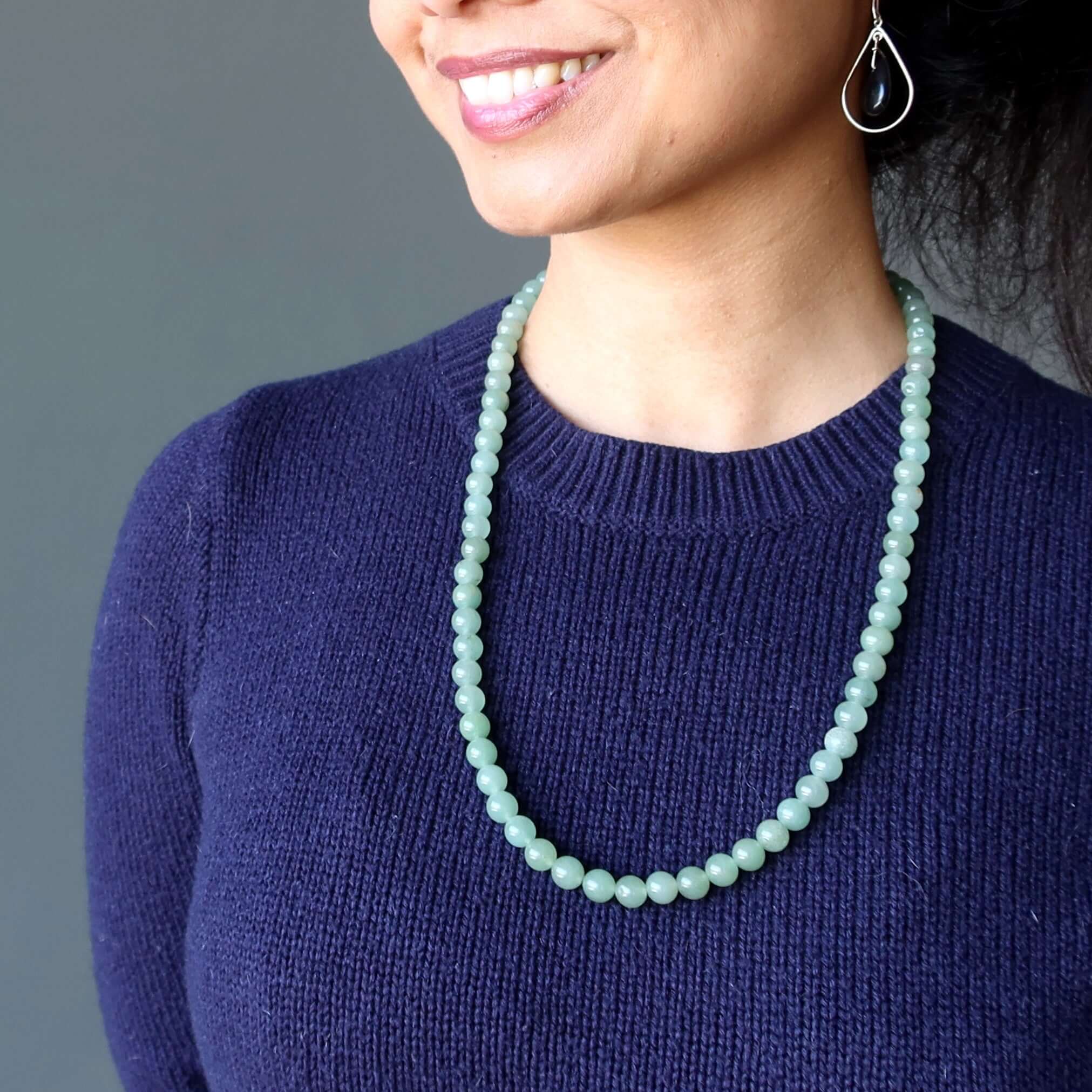 Green Aventurine necklace wear your wealth stones on woman in navy sweater, 7-8mm gemstone bead strand for abundance style