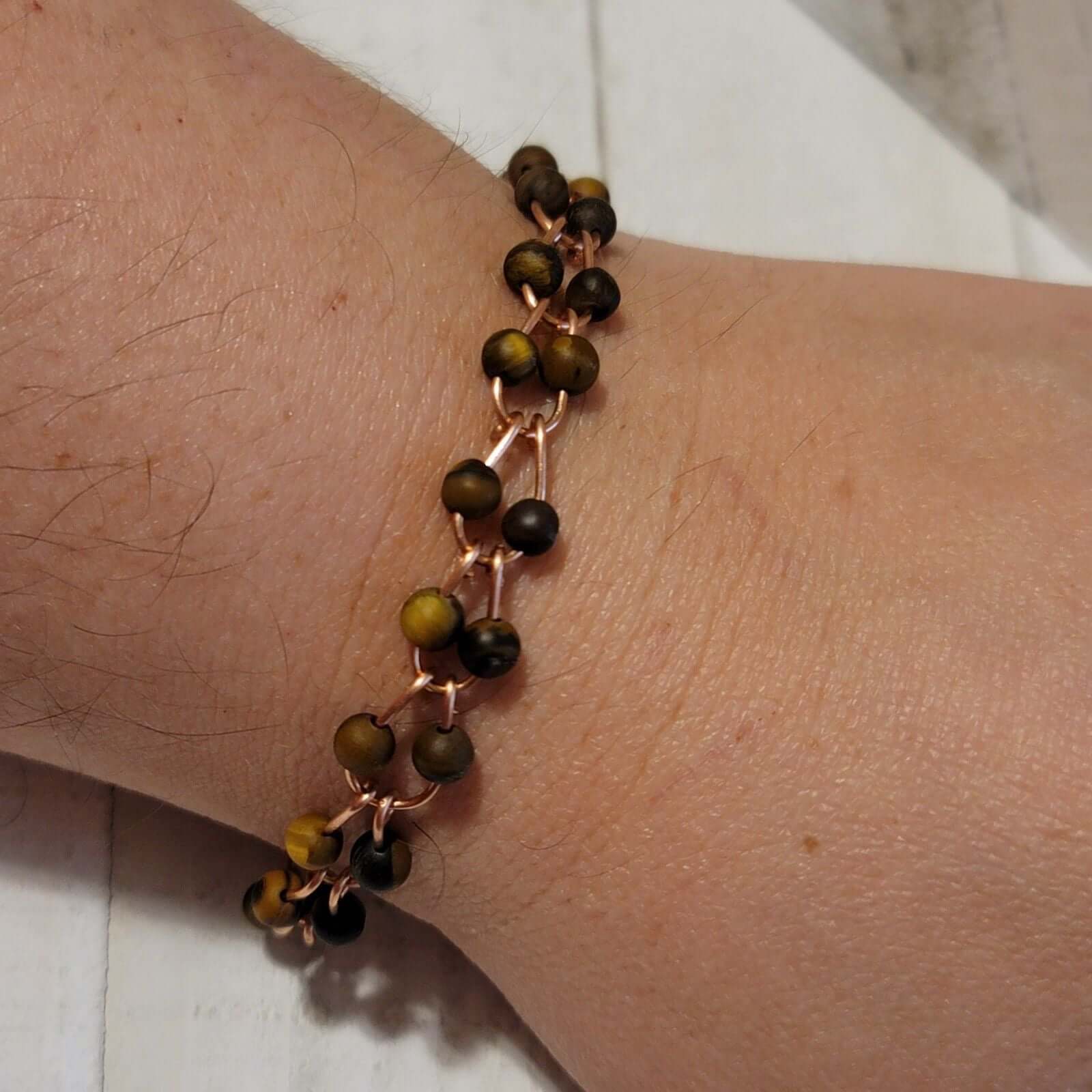 Bracelet à maillons en fer à cheval en cuivre fait main avec perles œil de tigre
