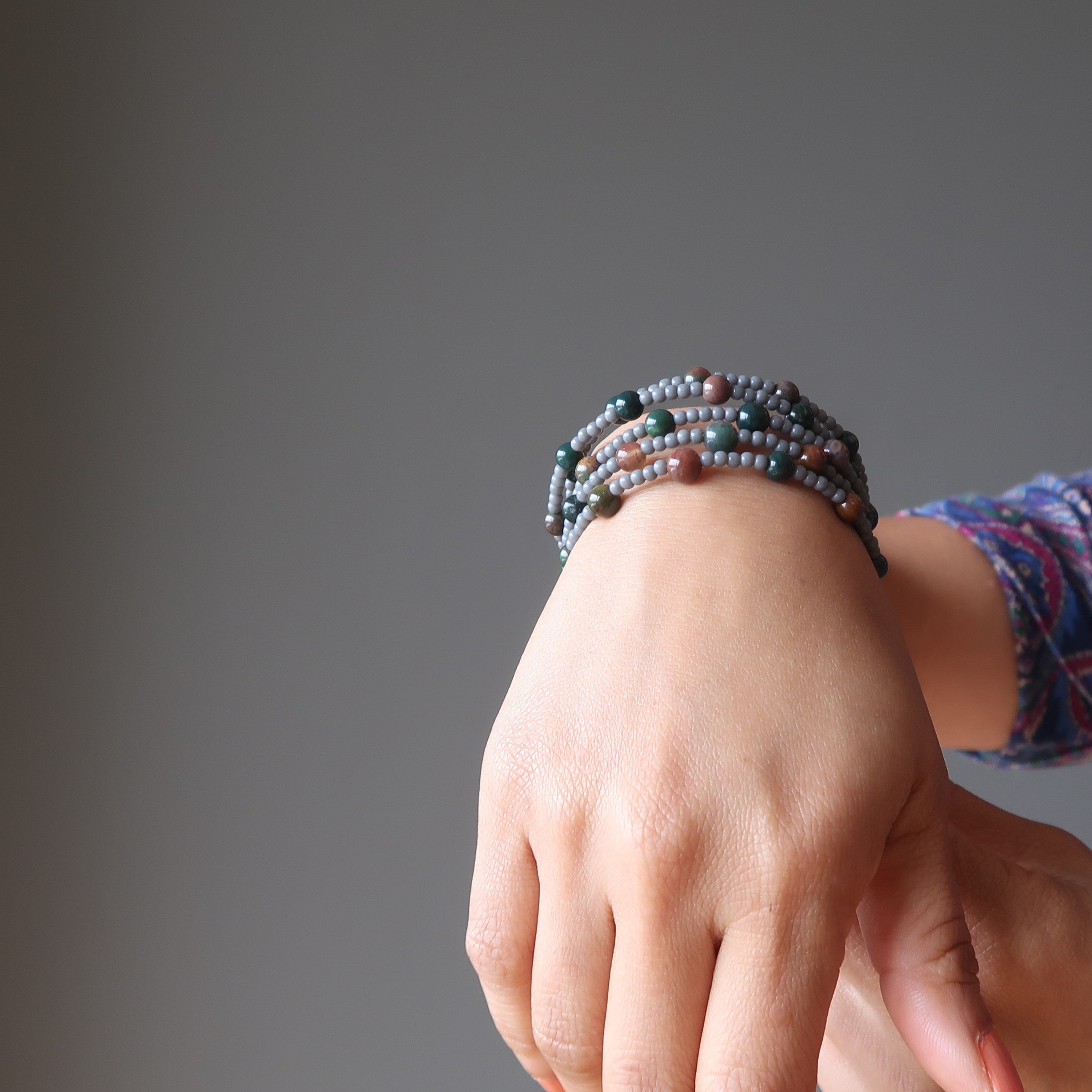 Bracelet Pierre de Sang Fil Mémoire Réglable Empilable Magique