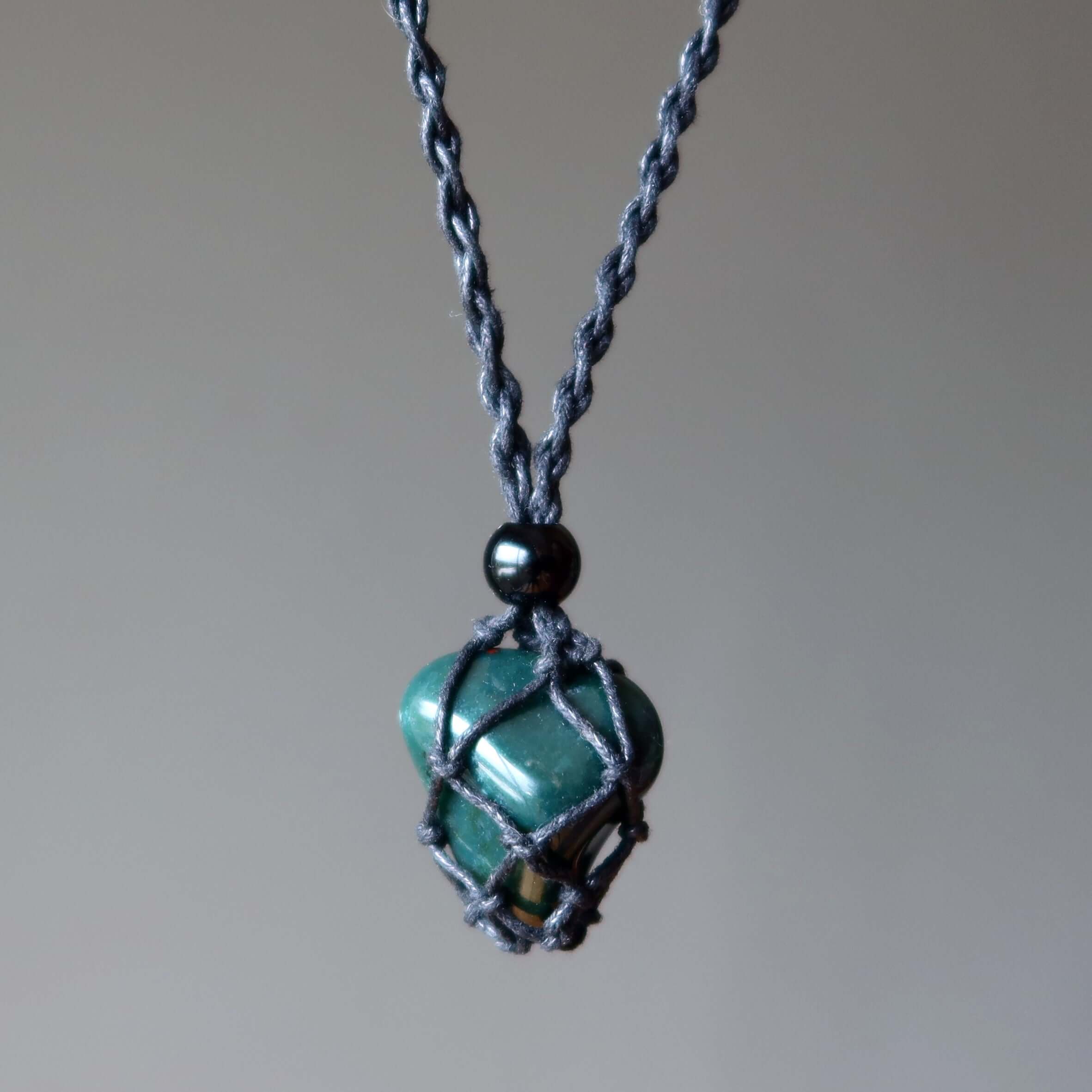 Bloodstone necklace courage carrier with green gemstone in macrame net on adjustable cord