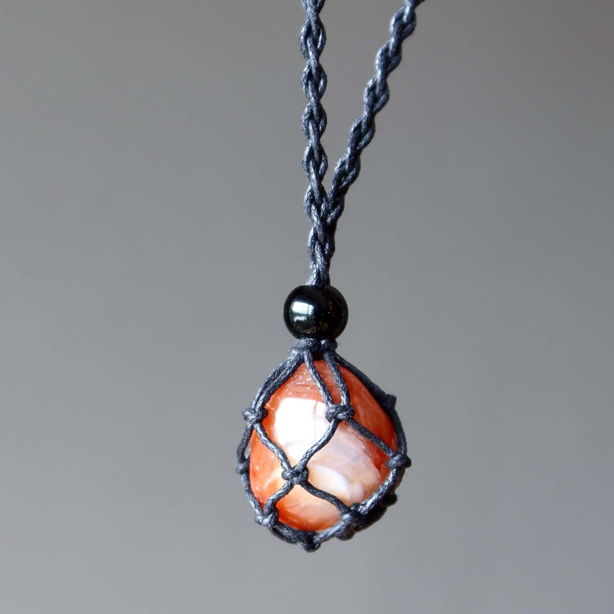 Carnelian necklace with orange hot stone in black macrame cord, adjustable handcrafted crystal pendant jewelry