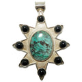 Chrysocolla sterling silver 8-point star pendant with large oval gemstone and black accent stones