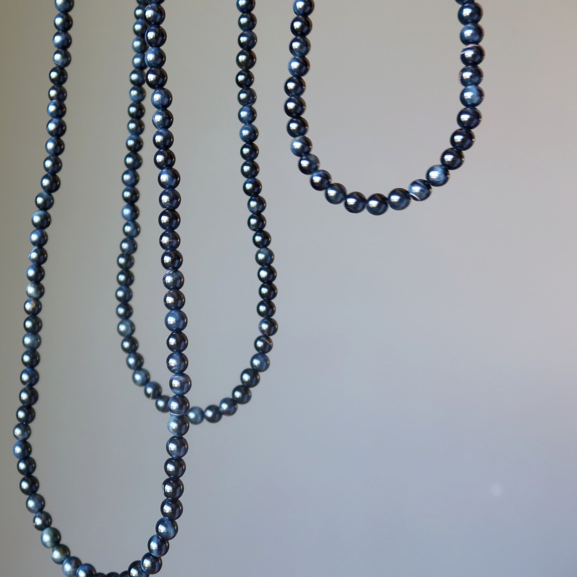 Collier Œil de Faucon Perles Pierres Précieuses Vole Haut