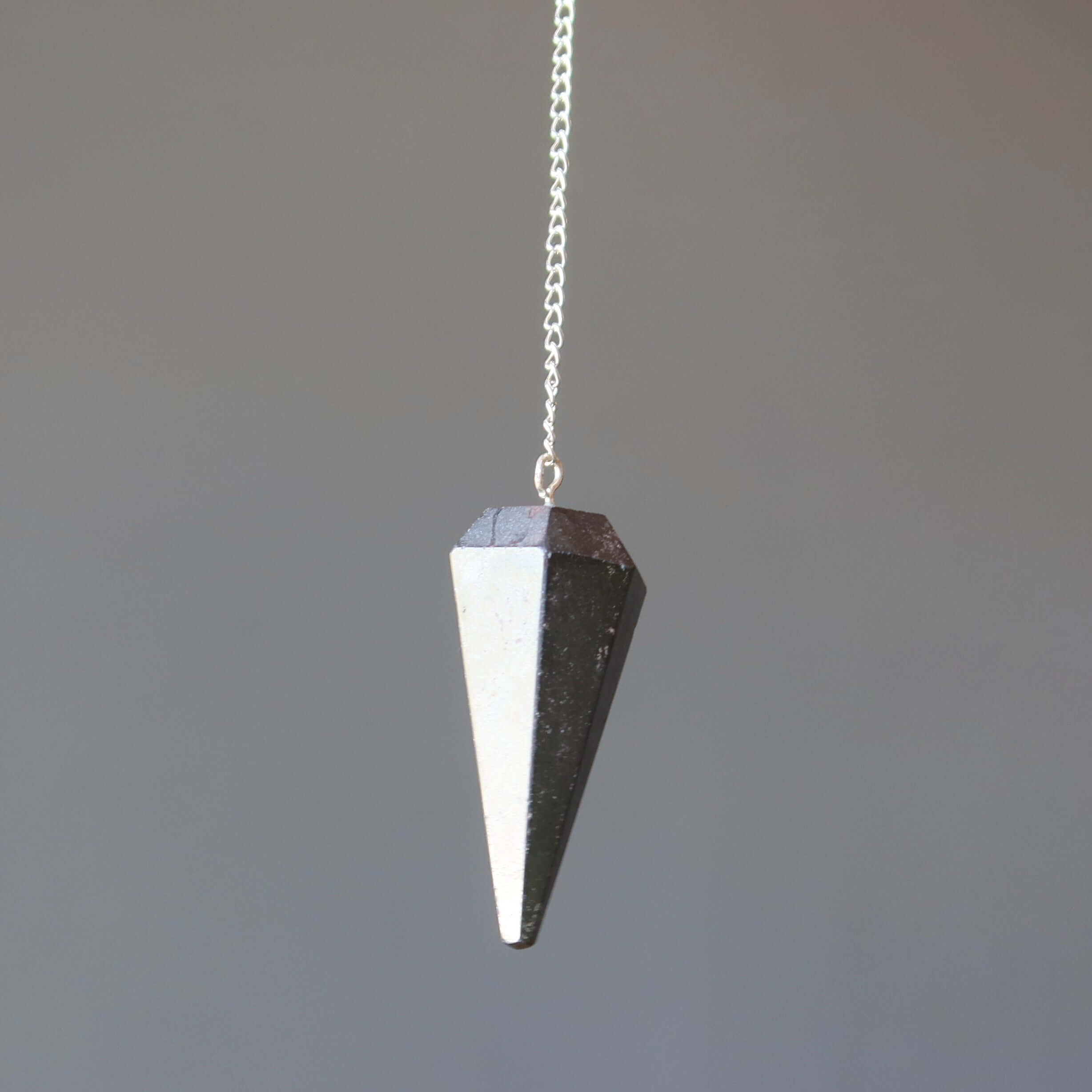 Hematite Pendulum Open Mind Dowsing Stone of Truth crystal for grounding and spiritual healing on silver chain