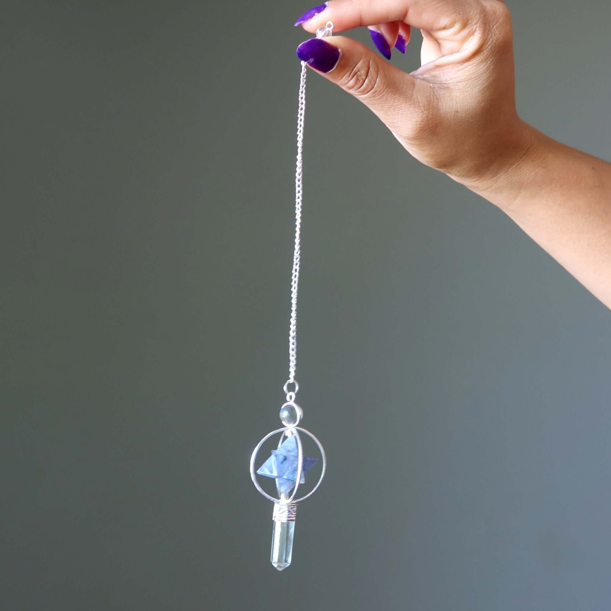 Pendentif en quartz clair et étoile merkaba en iolite
