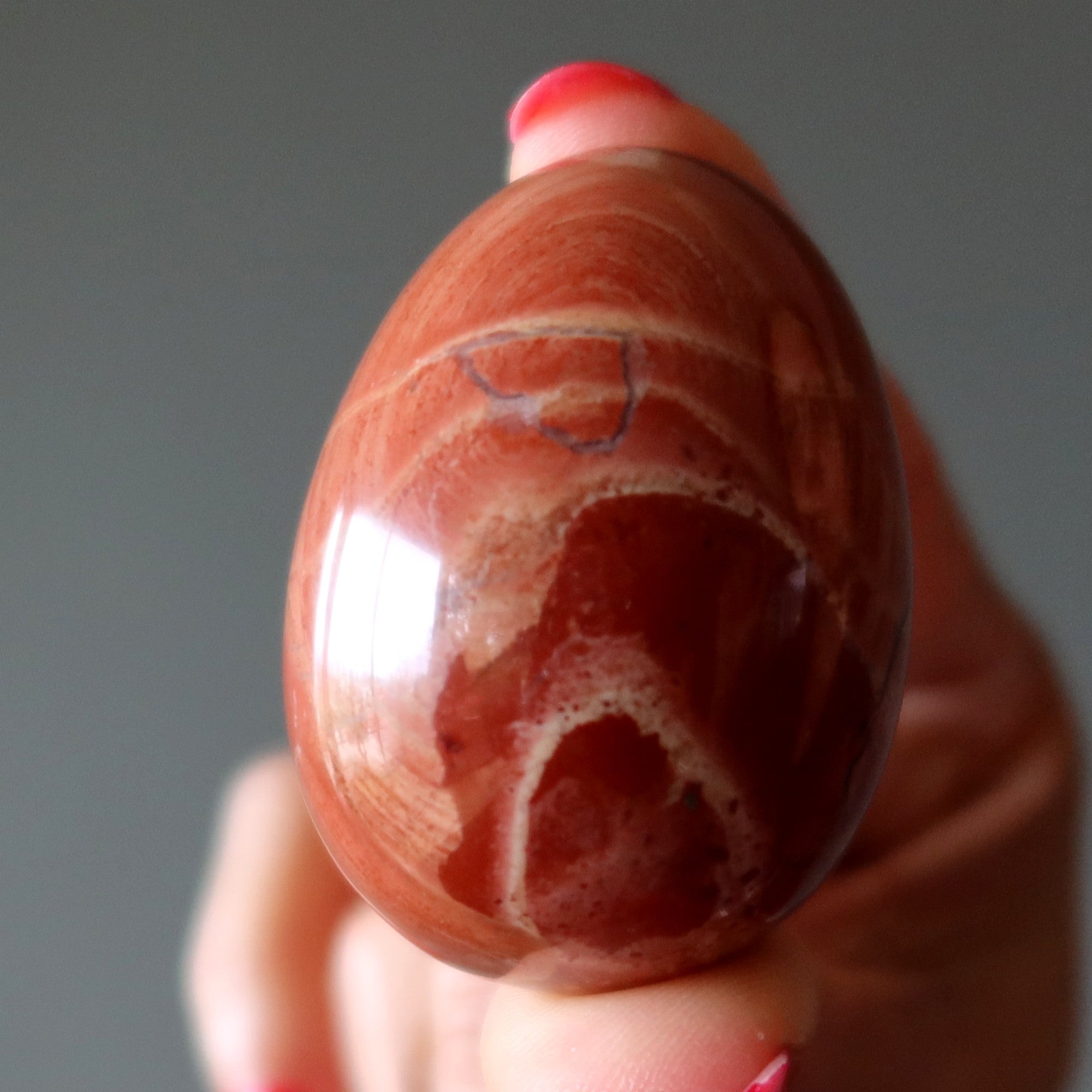 Roter Jaspis-Ei Kundalini Spiritueller gestreifter Stein