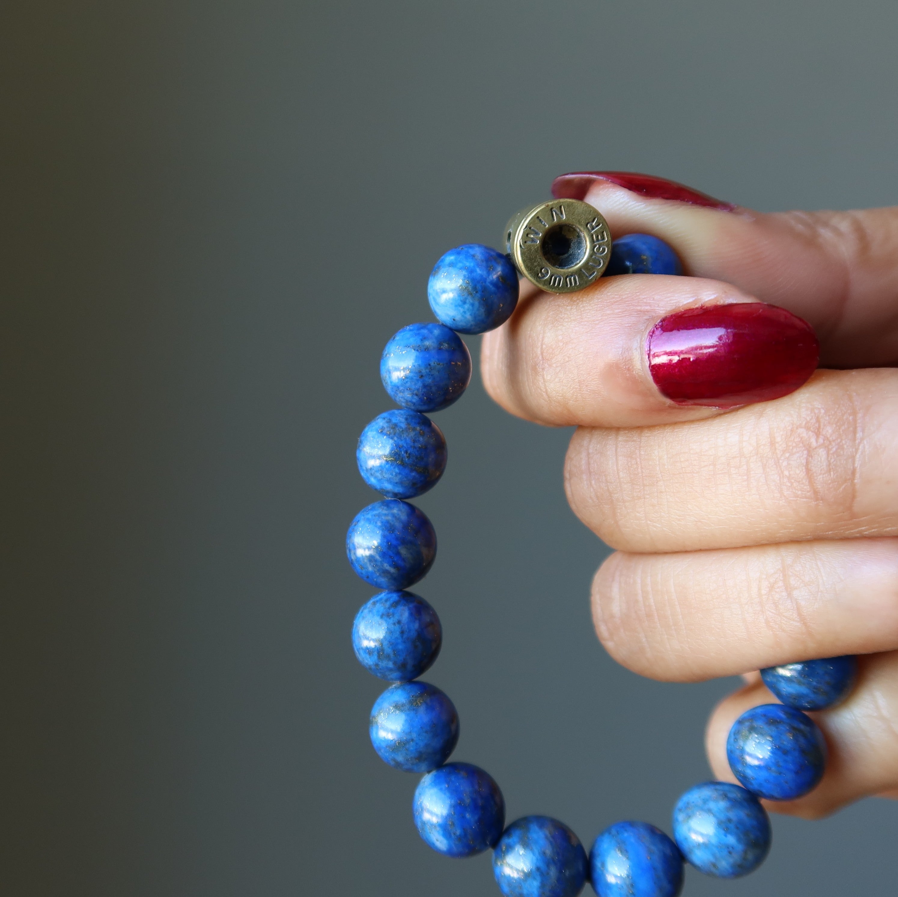 Lapis Lazuli Bracelet Blue Gold Designer Peacekeeper Bullet Stone