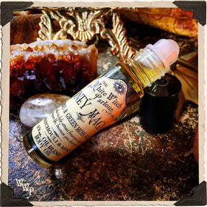 MONEY MAGICK Elixir 1/3oz. BODY OIL Rollon. Scent of Patchouli & Mint. Blessed by Citrine & Green Moss Agate Crystals.