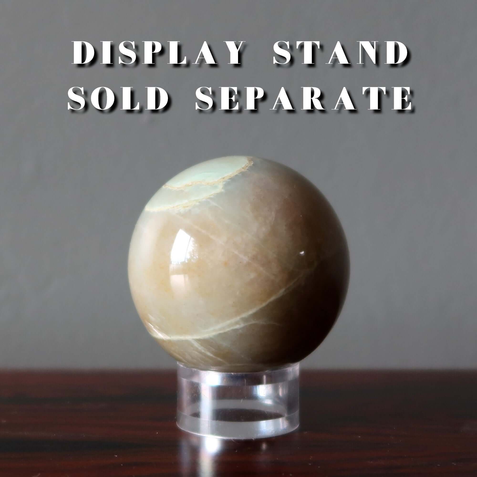 Sphère en pierre de lune crème, boule de cristal, guerrier blessé
