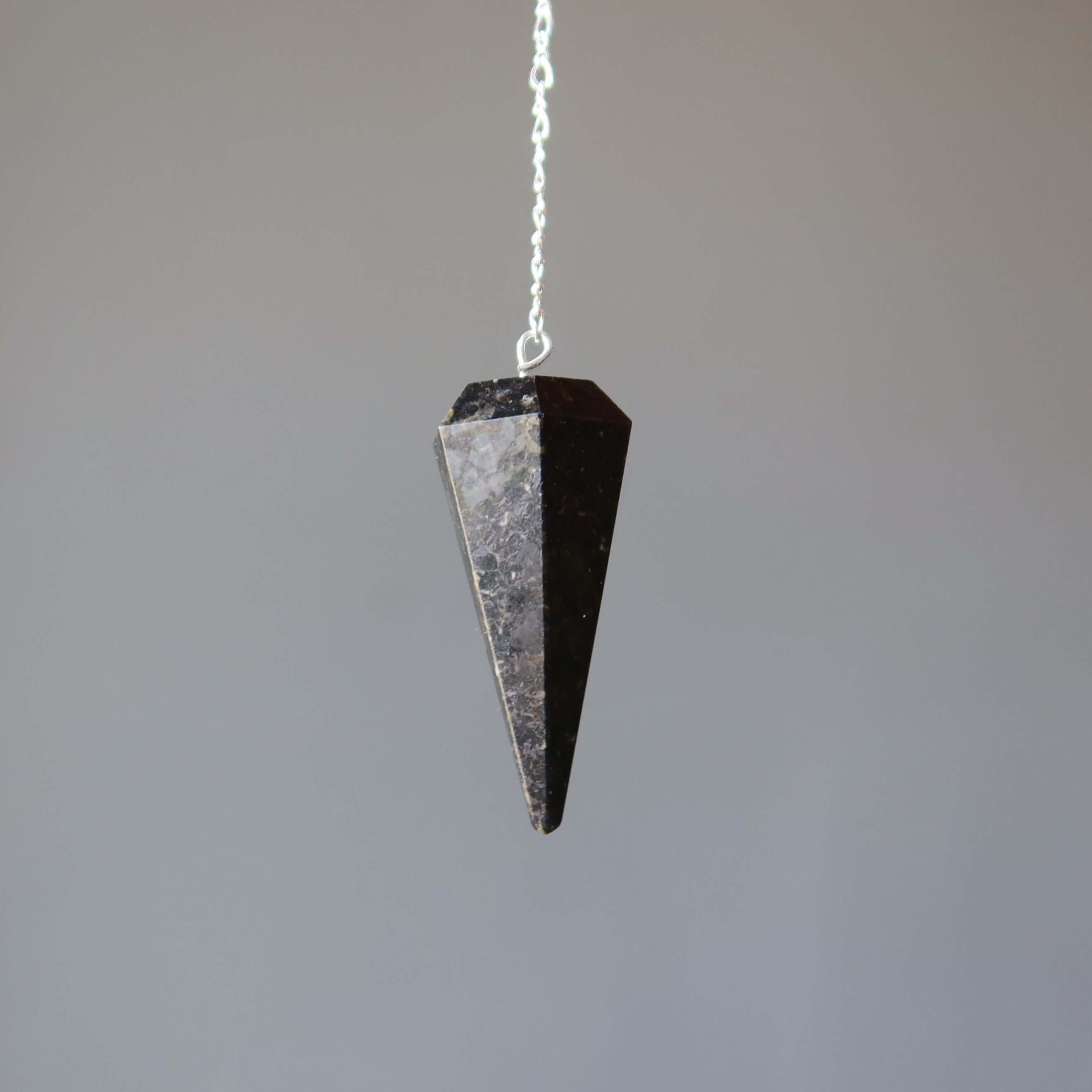 Nuummite Pendulum Mysteries Sterling Silver crystal dowsing Pendulum for healing, chakra assessment and spiritual guidance