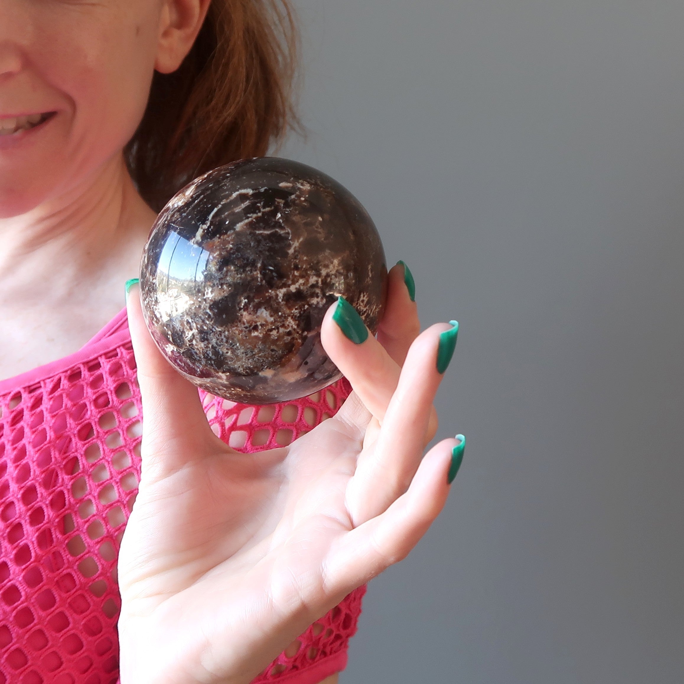 Sphère d'opale marron, boule de cristal du Guerrier blessé