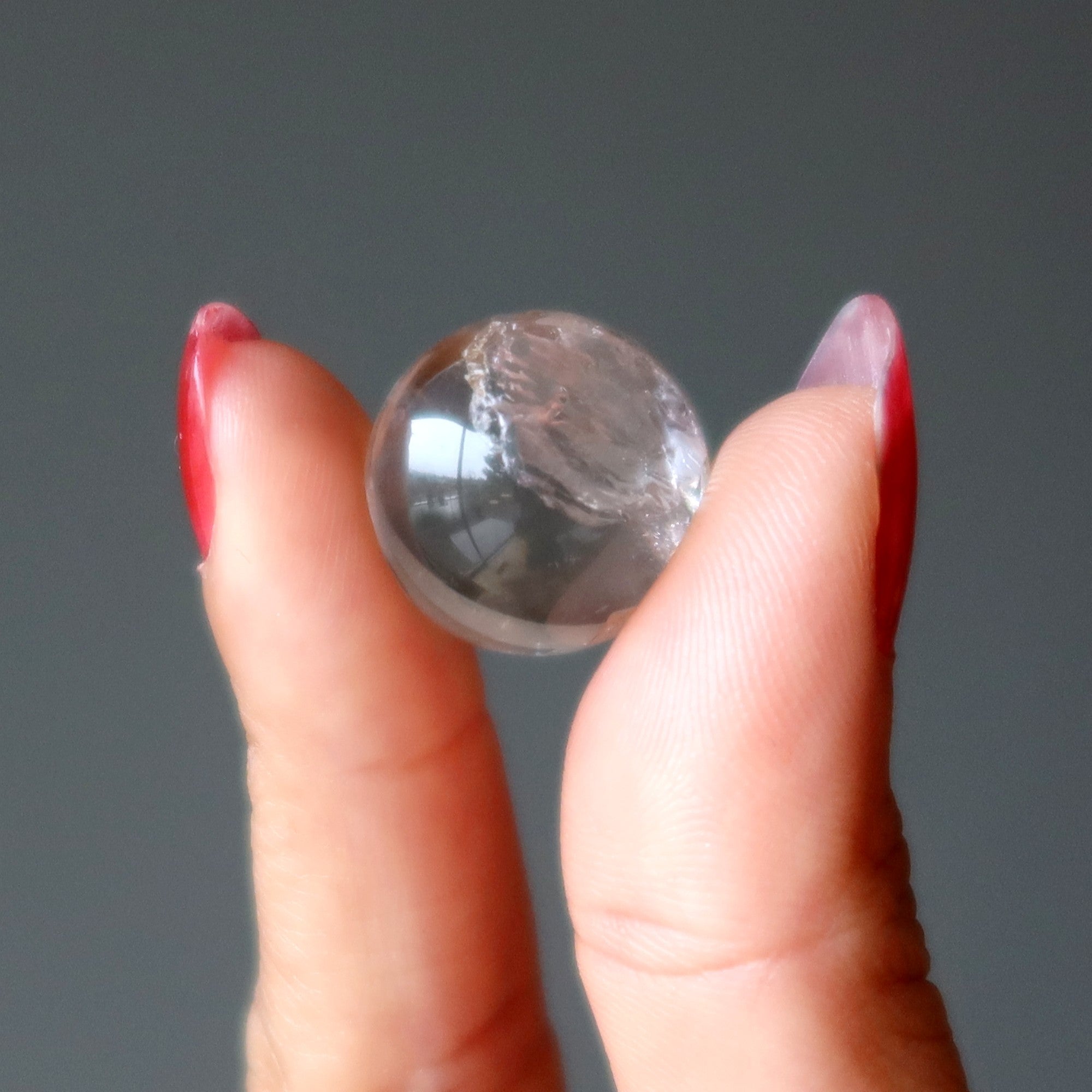 Sphère de quartz clair : Visions dans la boule de cristal de divination temporelle