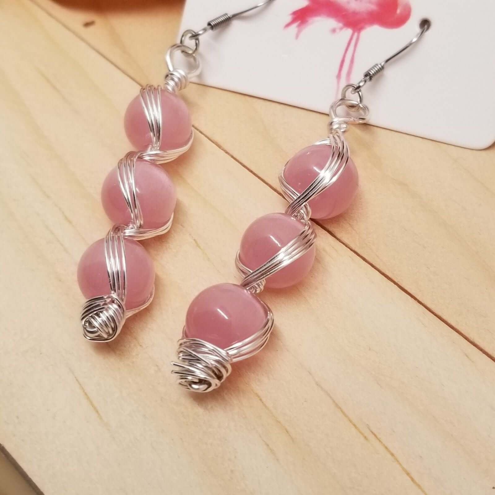 Handmade Pink Cat’s Eye Bead Earrings – Wire Wrapped Dangle Jewelry with stacked pink beads and silver-tone wire on hooks