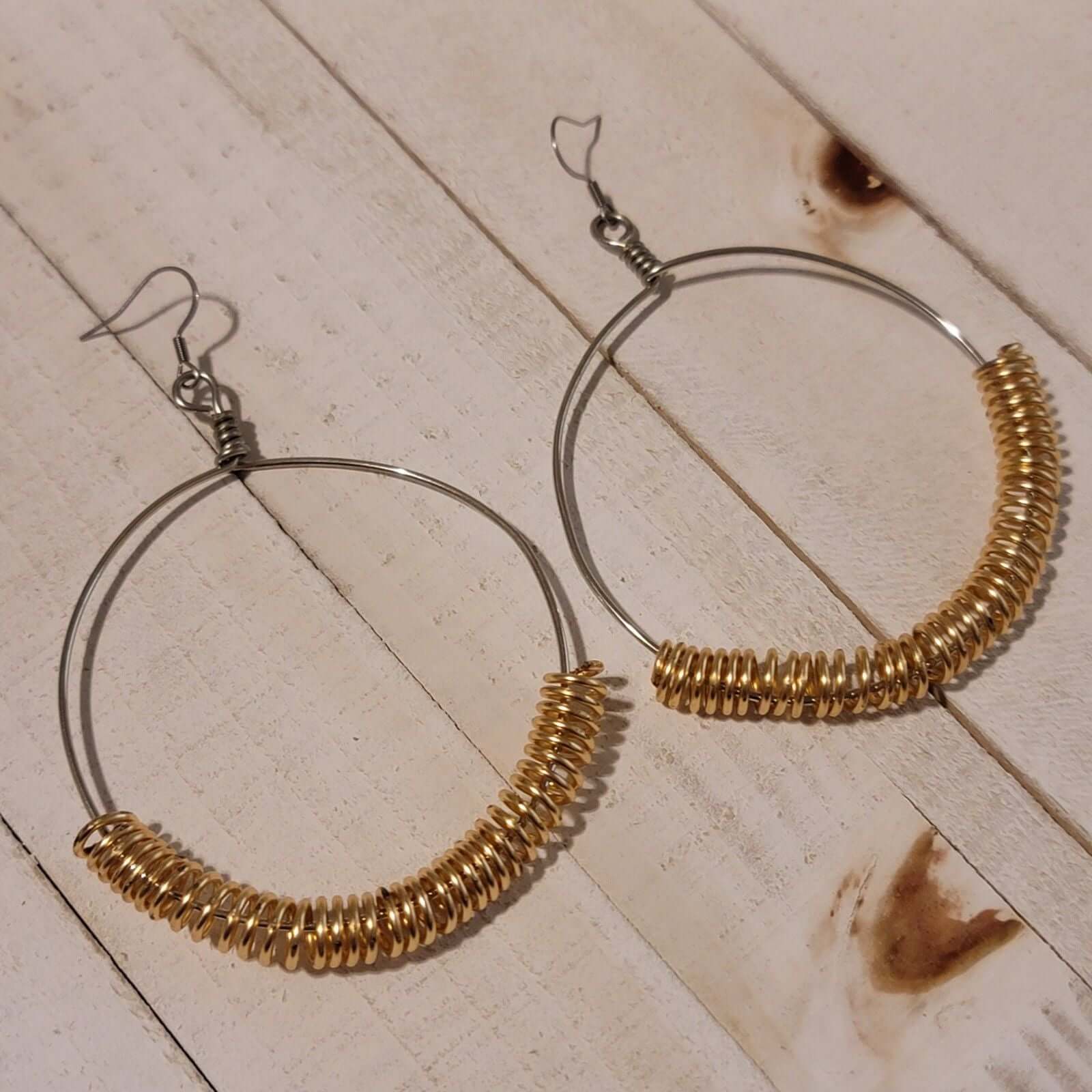 Handmade Gold Spring Hoop Earrings – Lightweight Wire Wrapped Hoops with mixed metal gold coil design on silver-tone wire