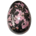 Œuf de rhodonite, cristaux nourrissants roses et noirs en dentelles de l'amour