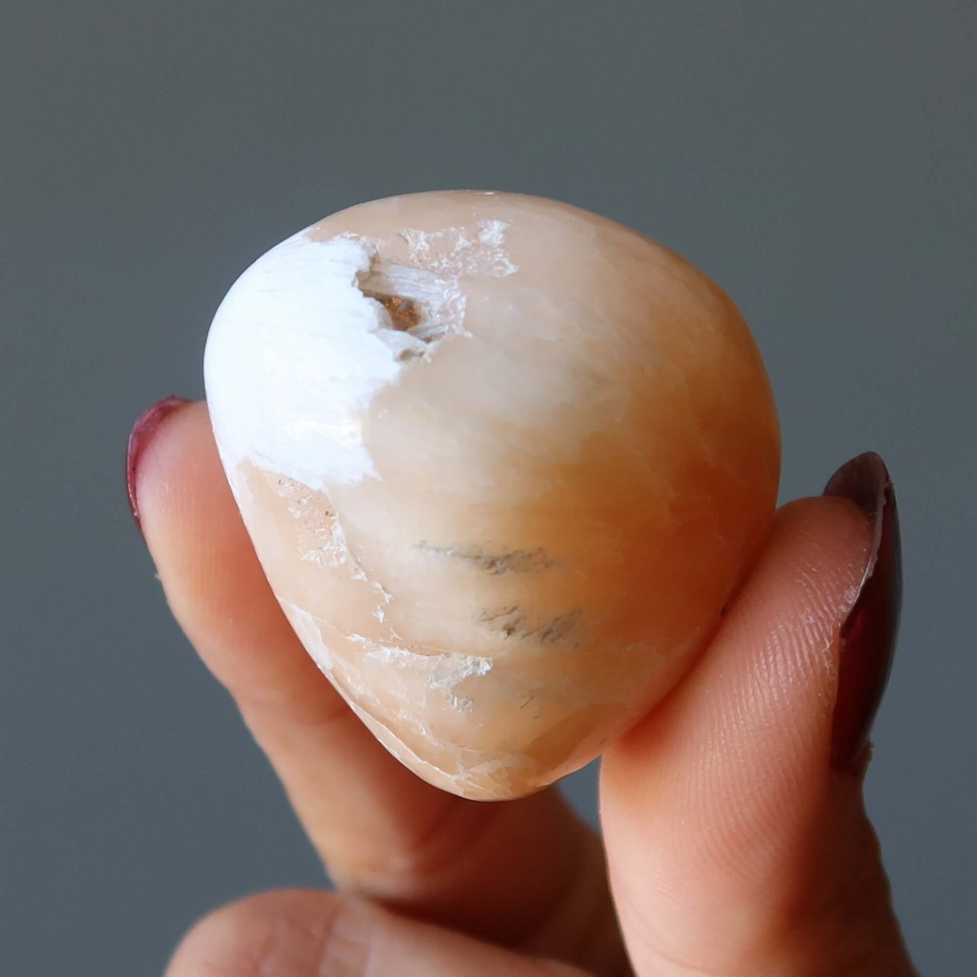 Scolecite Tumbled Stone Orange Quest
