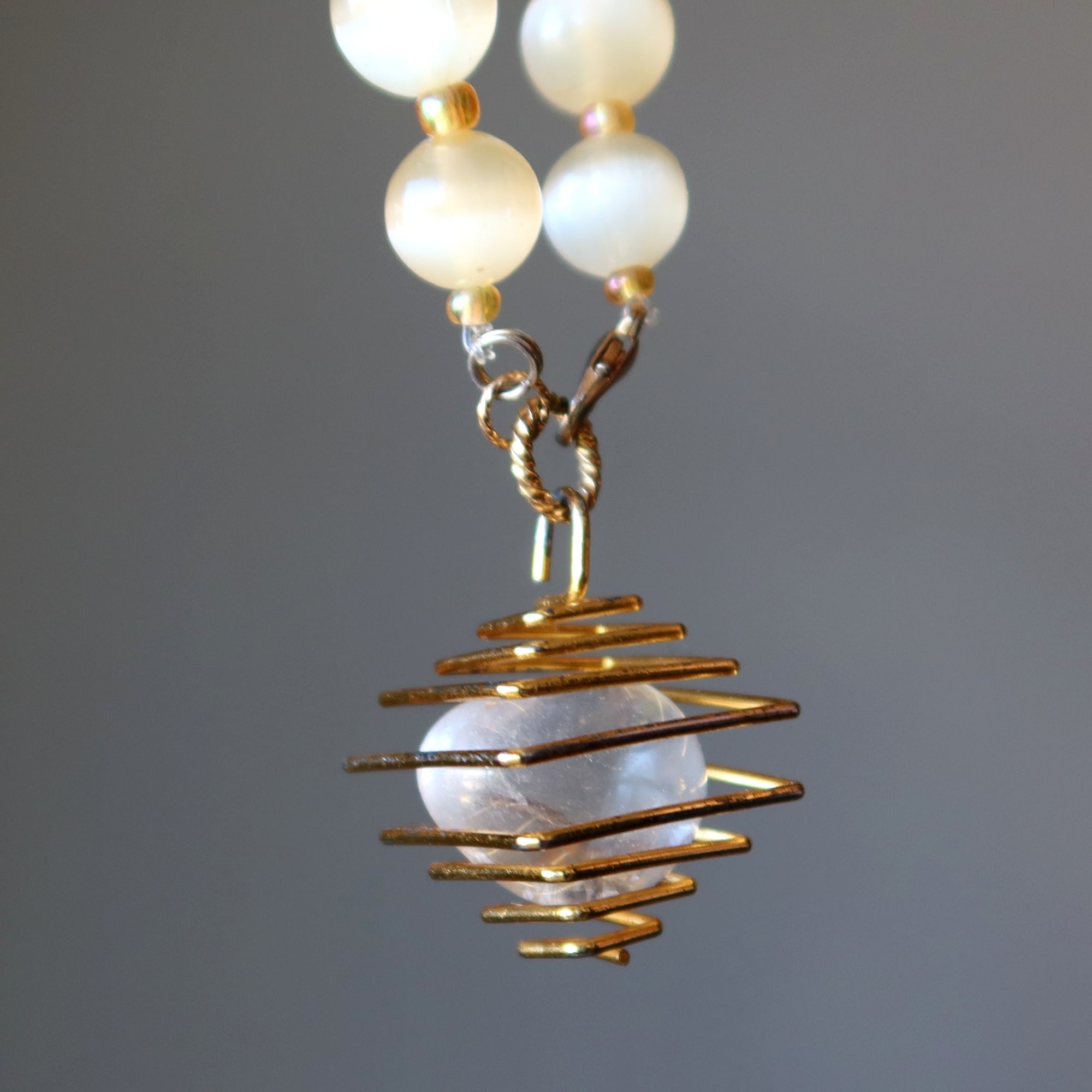 Selenite Necklace Warm Orange Beads with Caged Quartz