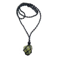 Serpentine necklace with green transformation stone in black macrame net on adjustable cord