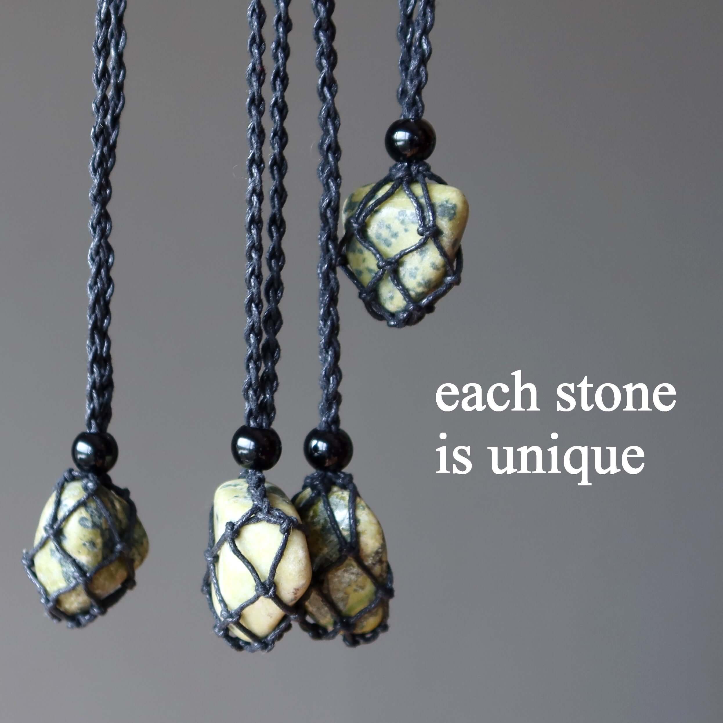 Serpentine necklace macrame pendants with unique green transformation stones, each Serpentine crystal wrapped in black netting
