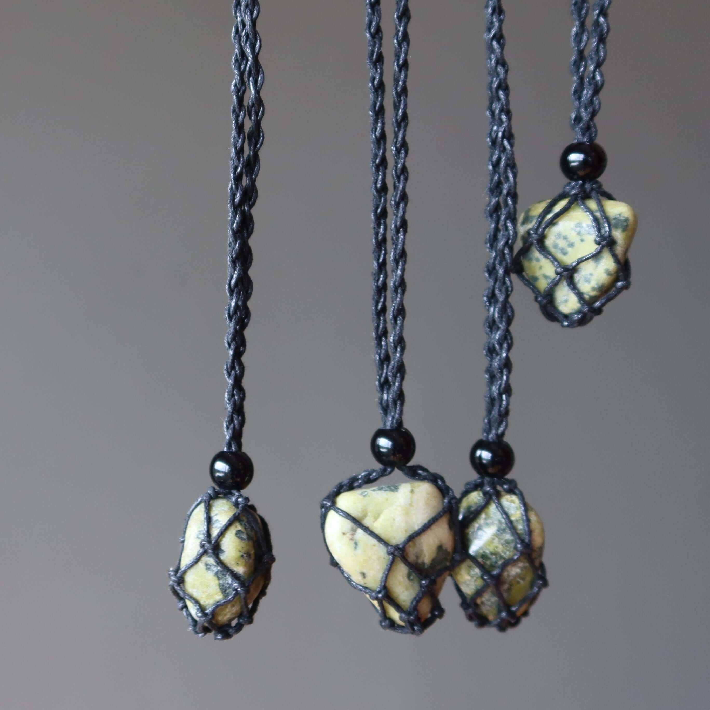 Serpentine necklace transformation stone in black macrame net, adjustable crystal pendant for positive energy and manifestation