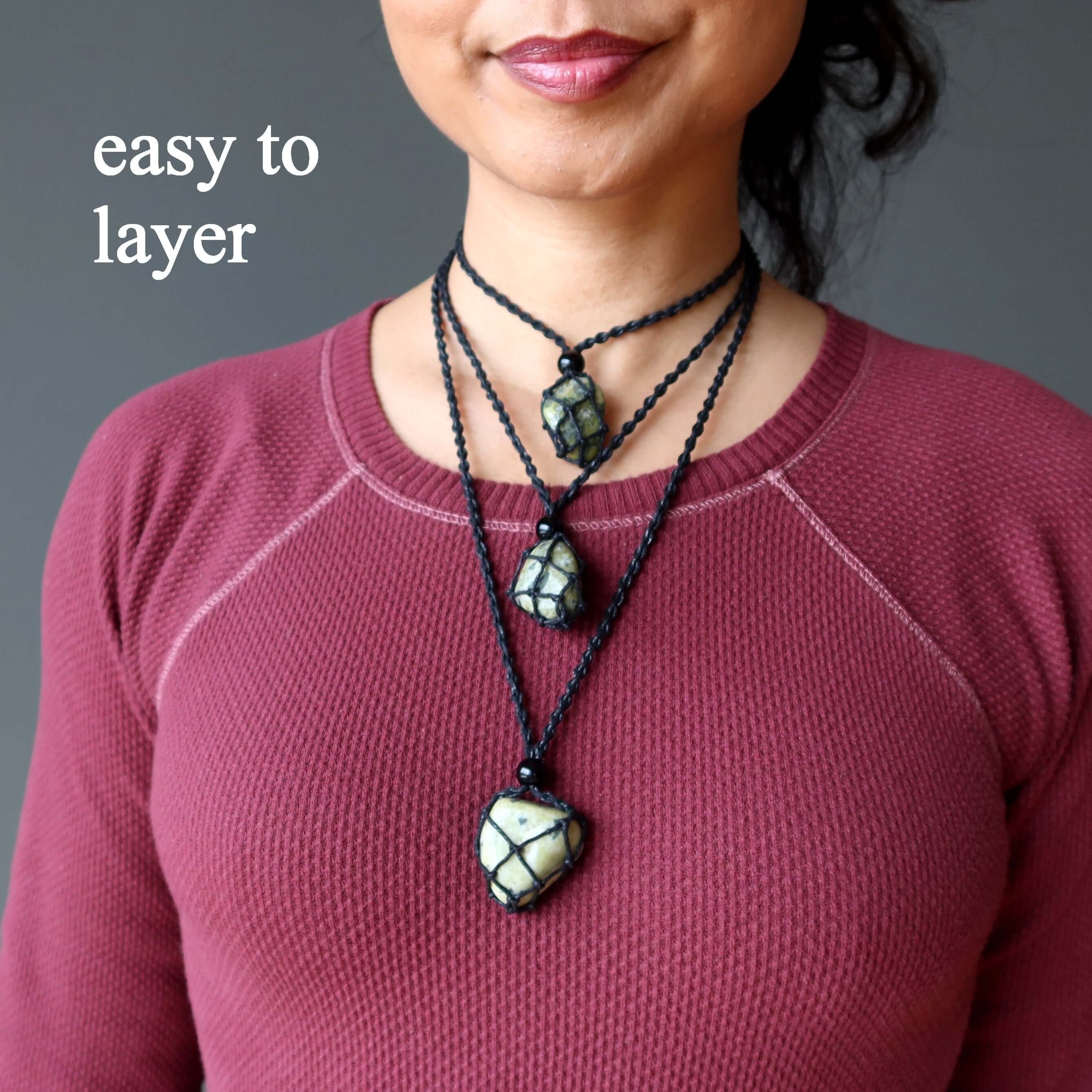 Layered Serpentine macrame necklace on model showing adjustable green transformation stone jewelry