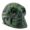 Figurine en cristal de siffleur extraterrestre vert foncé et crâne serpentin