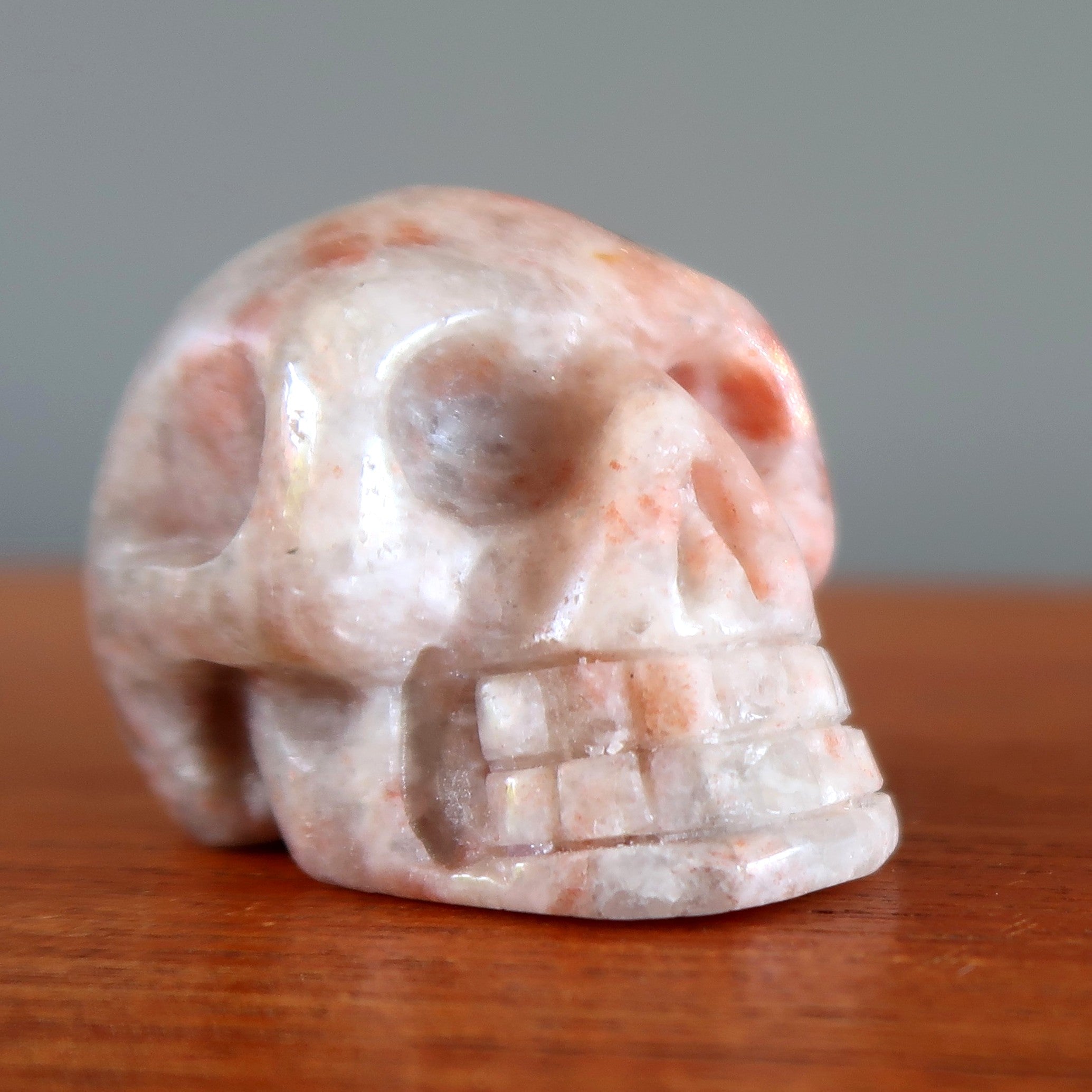Sunstone Skull Happy Orange Funny Bone Stone Crystal Statue