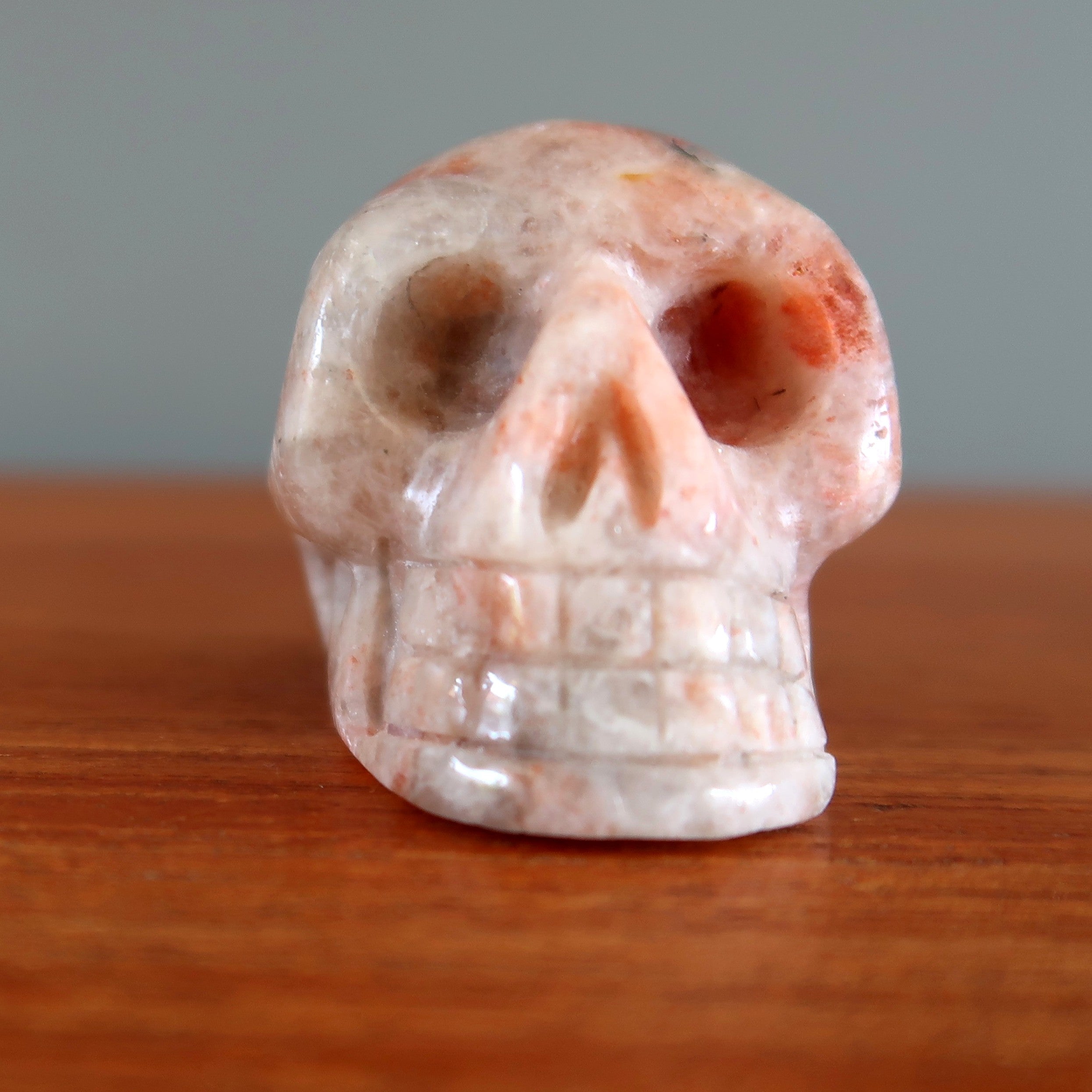 Sunstone Skull Happy Orange Funny Bone Stone Crystal Statue
