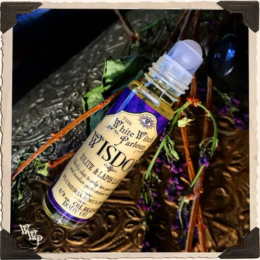 ( PRE-ORDER 2 week turnaround ) WISDOM Elixir 1/3oz. Body Oil Rollon. Plumeria & Mulberry Blessed with Iolite & Lapis Lazuli Crystals.