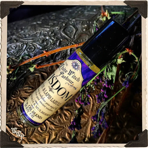 ( PRE-ORDER 2 week turnaround ) WISDOM Elixir 1/3oz. Body Oil Rollon. Plumeria & Mulberry Blessed with Iolite & Lapis Lazuli Crystals.